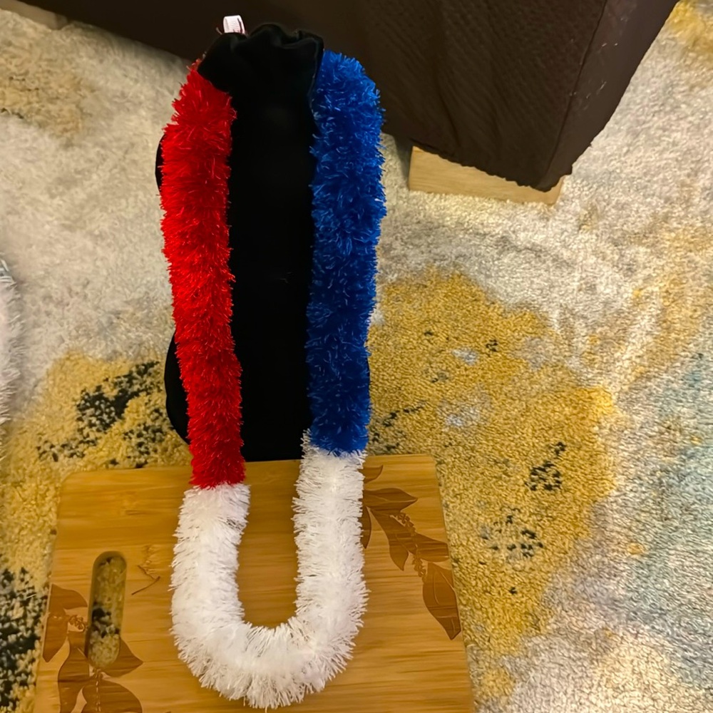 Hawaiian crochet yarn/eyelash yarn lei. Red, white, blue